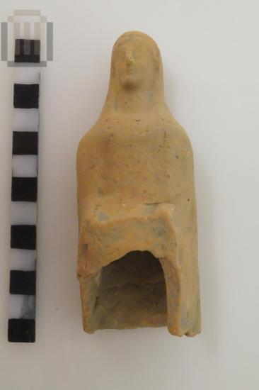 Seated female figurine