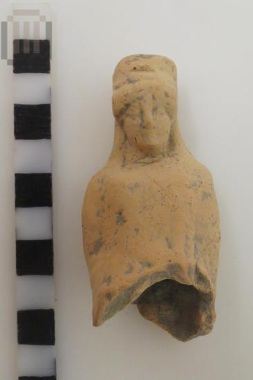 Female seated figurine