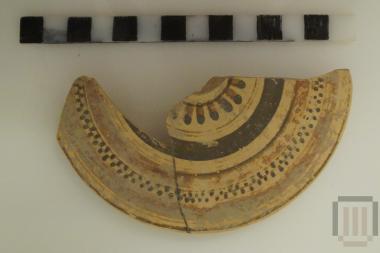 Fragment of pyxis lid