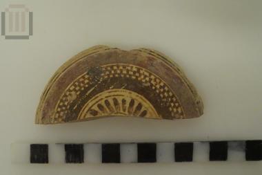 Fragment of pyxis lid