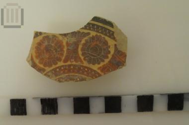 Fragment of pyxis lid