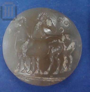 Incised lenticular stone seal