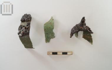 Iron spur(?) fragment and bronze sheet metal fragments from Agios Donatos Zervochori