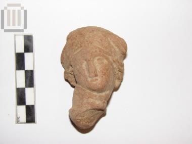 Head from a terracotta figurine of a female figure
