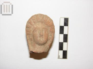 Head from a terracotta figurine of a female figure