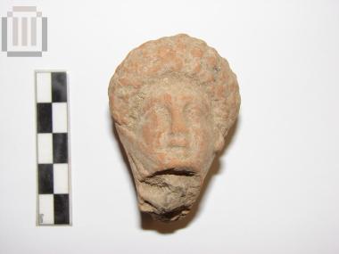 Head from a terracotta figurine of a female figure