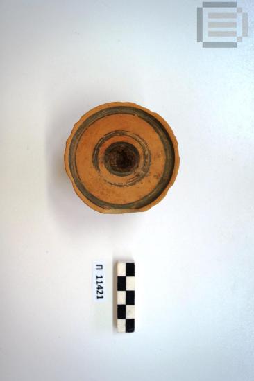 Κομβίο πώματος αγγείου, από την Ρουντίνα Κοπανού