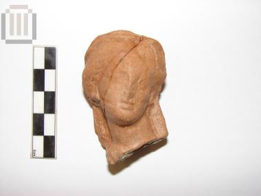 Head from a terracotta figurine of a female figure