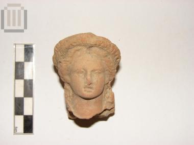 Head from a terracotta figurine of a female figurine