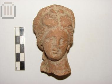 Head from a terracotta figurine of a female figurine
