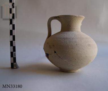 One-handled clay jug