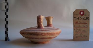 Small clay stirrup jar