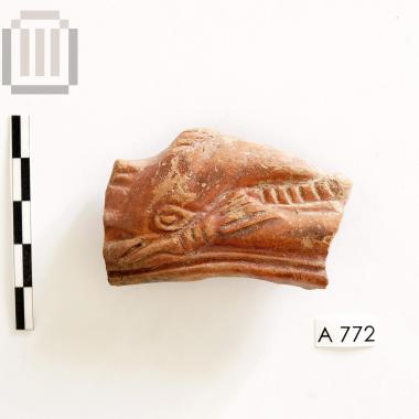 Plate with relief decoration [sherd]