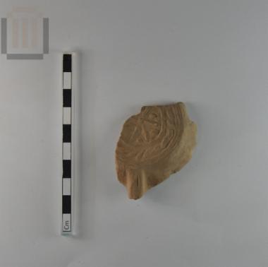 Part of a clay lamp from Dymokastro