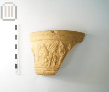Απότμημα ανάγλυφου σκύφου από το Λαδοχώρι