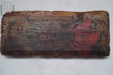 Wooden item with painted decoration