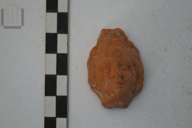 Κεφάλι πήλινου ειδωλίου παιδικής μορφής