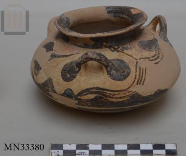 Three-handled clay squat alabastron