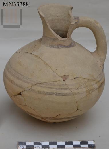 Clay jug with cutaway neck