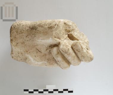 Statue fragment of a male figure
