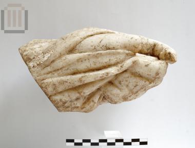 Statue fragment of a female figure