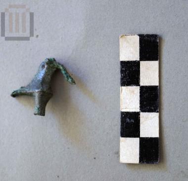 Part of a bronze animal shaped object