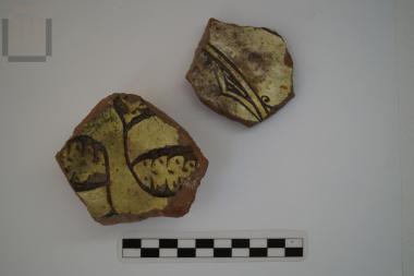 Part of a glazed late sgraffito bowl