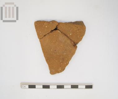 Handmade clay vase fragment from the Sideri cave