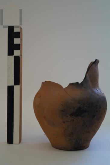 Part of vase of closed shape
