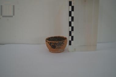 Small black slip clay bowl (micrographic vase)
