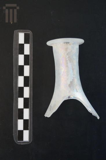 Part of a small glass bottle