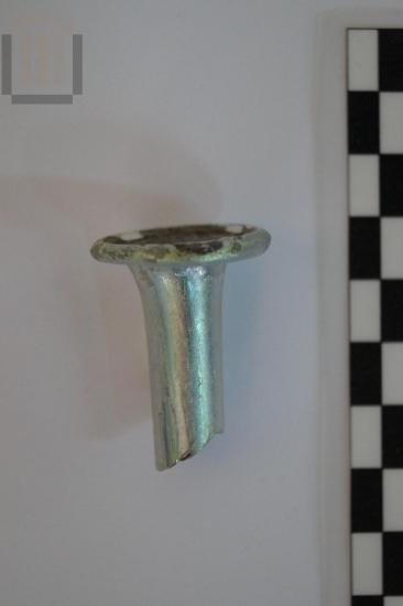 Part of a small glass bottle