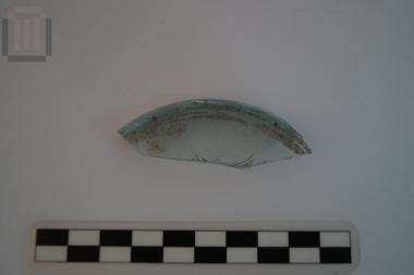 Part of an open shape glass vase with engraved decoration