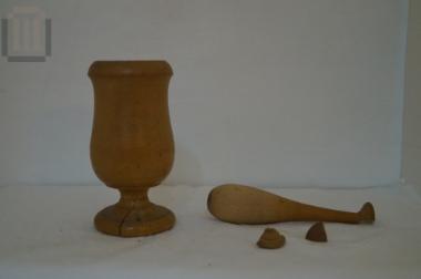 Wooden mortarium (A) and pestle (B)