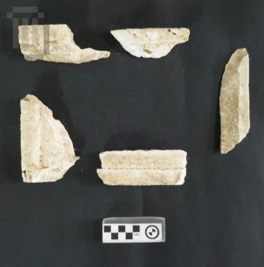 Chest-form funerary urn fragments from Gitana