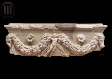 Part of sarcophagus with relief decoration