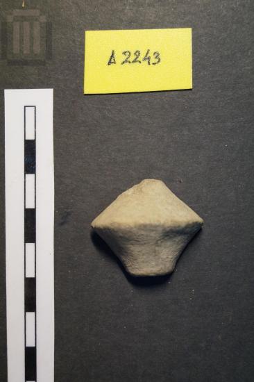 Part of a spindle whorl