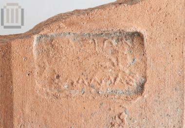 Fragment of a Thasian stamped roof tile