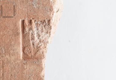 Part of a stamped roof tile of Thasos