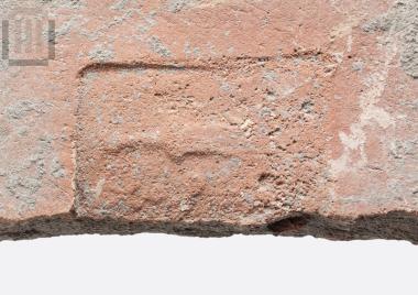Part of a stamped roof tile of Thasos