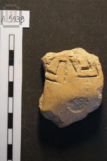 Fragment of a close-shaped vase