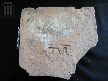 Stamped brick 'TVR'