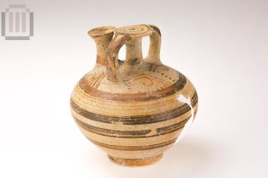 Globular squat stirrup jar