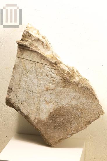 Part of funerary stele with a pedimental crowning