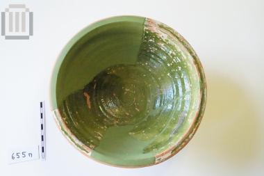 Glass coated pottery bowl