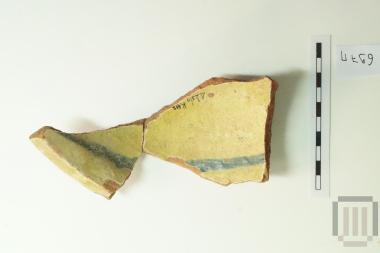 Part of glass coated pottery bowl