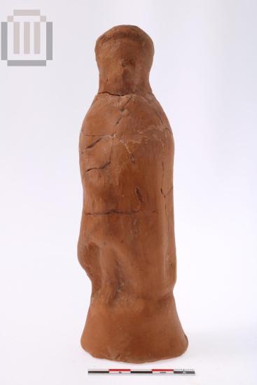 Terracotta  figurine of a boy wearing kausia