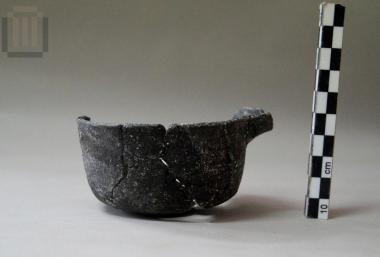 One-handled spouted cup