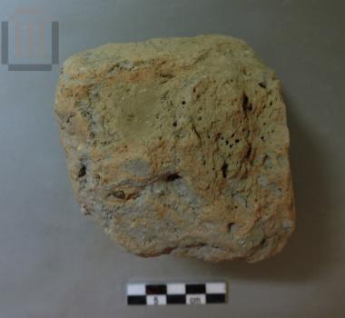 Fragment of a brick