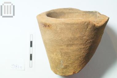 Part of amphora with pointed foot/base